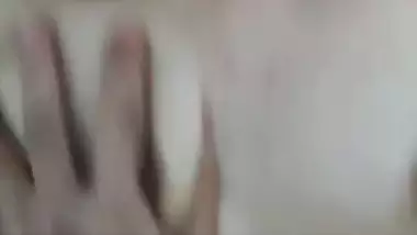 Brown haired cam girl boob pressing and pussy fingering