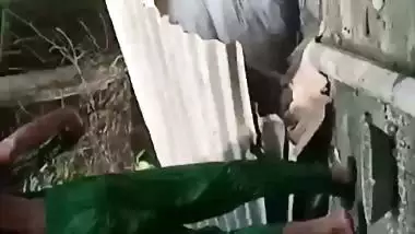 Village neighbor girl outdoor bath caught through hole